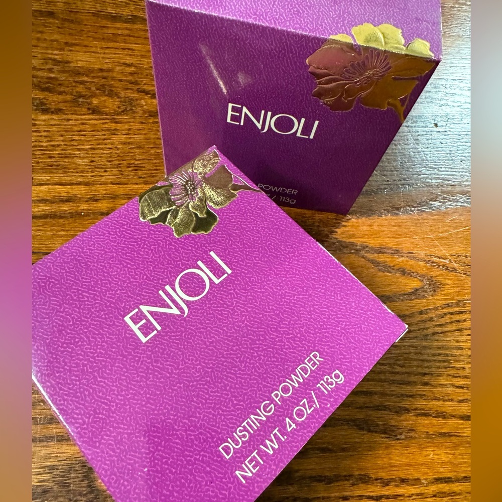 Two Vintage Enjoli Revlon Dusting Powder 4oz each. One puff, both sealed inside